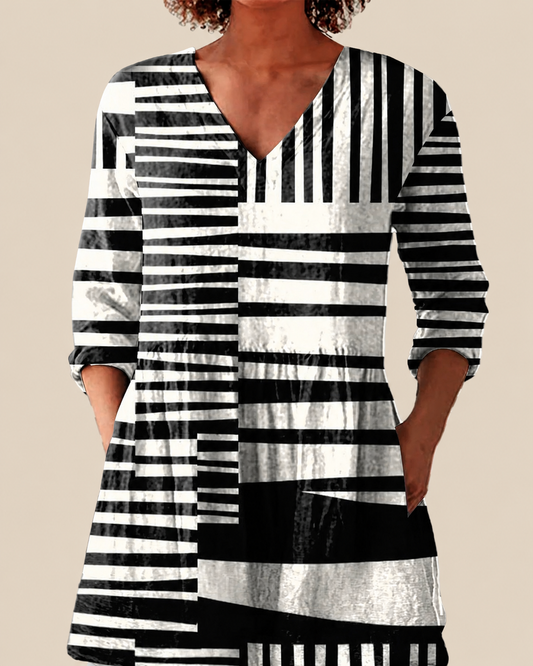 QIE - CAMICIA LUNGA CON FANTASIA D'IMPATTO
