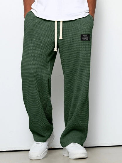 SAMY - PANTALONI A GAMBA LARGA CON ELASTICO IN VITA REGOLABILE