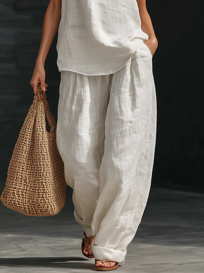 AYESHA - COMPLETTO TOP SENZA MANICHE CON SCOLLO A V E PANTALONI A GAMBA LARGA