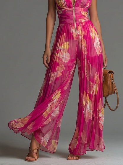 LAILA - JUMPSUIT PLISSETTATO FLOREALE FUCSIA