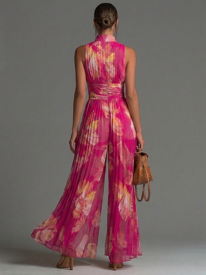 LAILA - JUMPSUIT PLISSETTATO FLOREALE FUCSIA